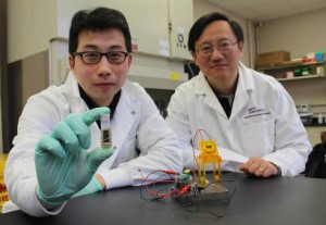 Percival Zhang (right) and Zhiguang Zhu, with a sugar fuel cell