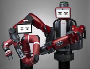 Industrial-standard robotic components, assembled with the most basic simulcrum of a face invites interaction