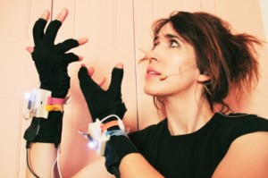 Imogen Heap wearing the Wi-Fi musical gloves