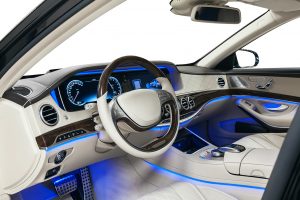 Car interior wood and leather decoration and blue ambient light