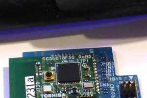 Toshiba bluetooth module next to a pen