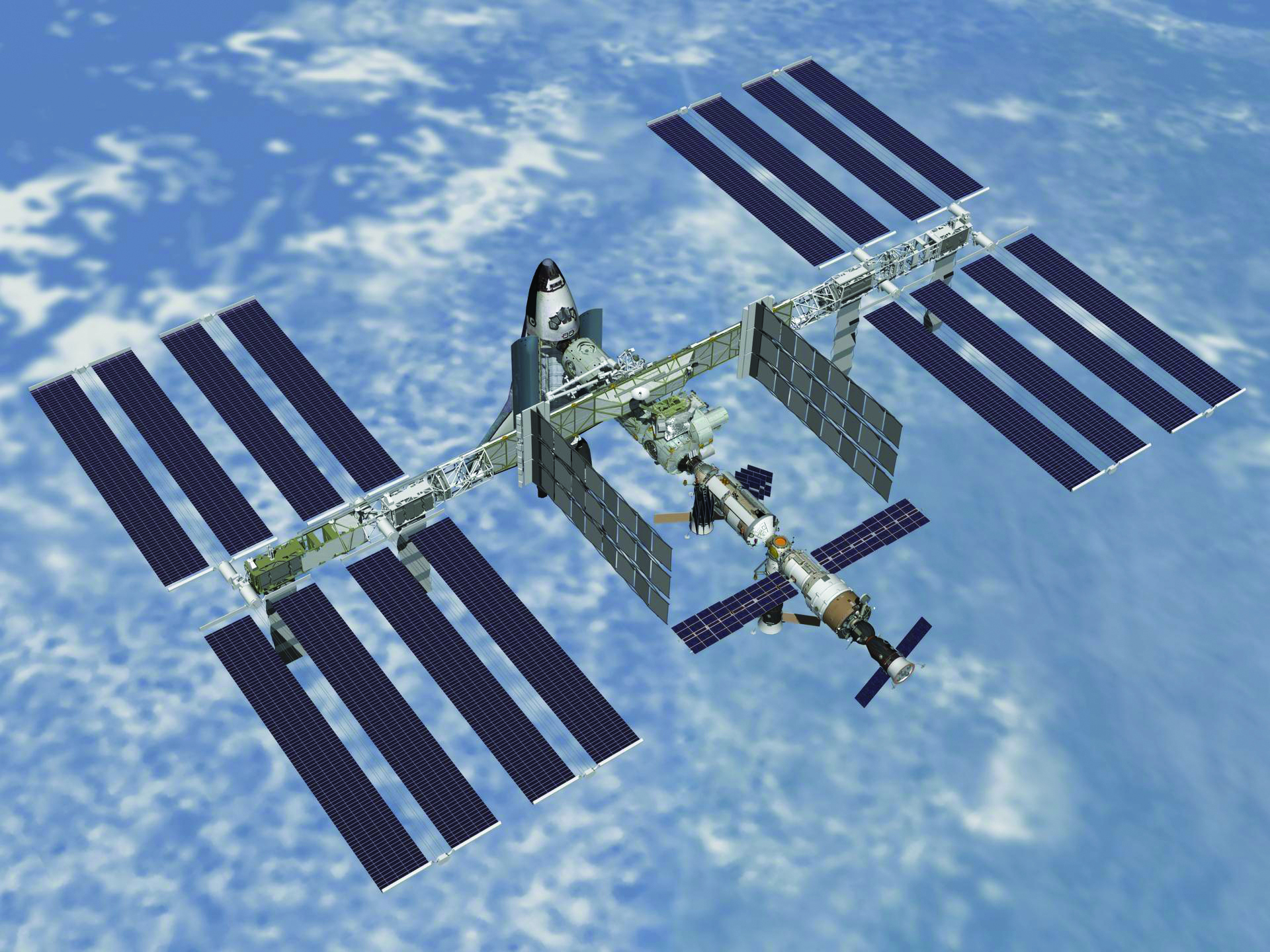https://static.electronicsweekly.com/wp-content/uploads/2019/07/17101310/NASA-shuttle-docked-with-space-station.jpg