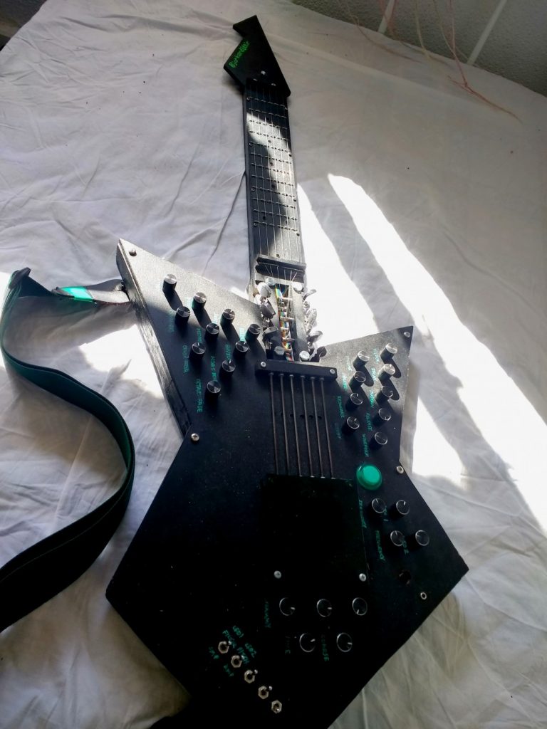 Synthguitar strums keyboard sounds