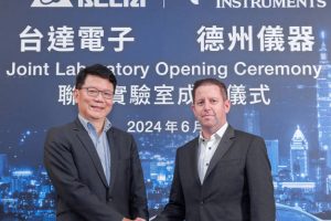 TI and Delta automotive power lab. Left to right: James Tang, Delta Electronics, and Amichai Ron, Texas Instruments