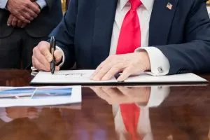 President-Trump-signing-exec-order-300x200.webp