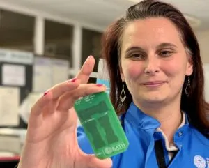 Dr Despina Moschou with LoCKAmp replaceable lab on chip printed circuit board